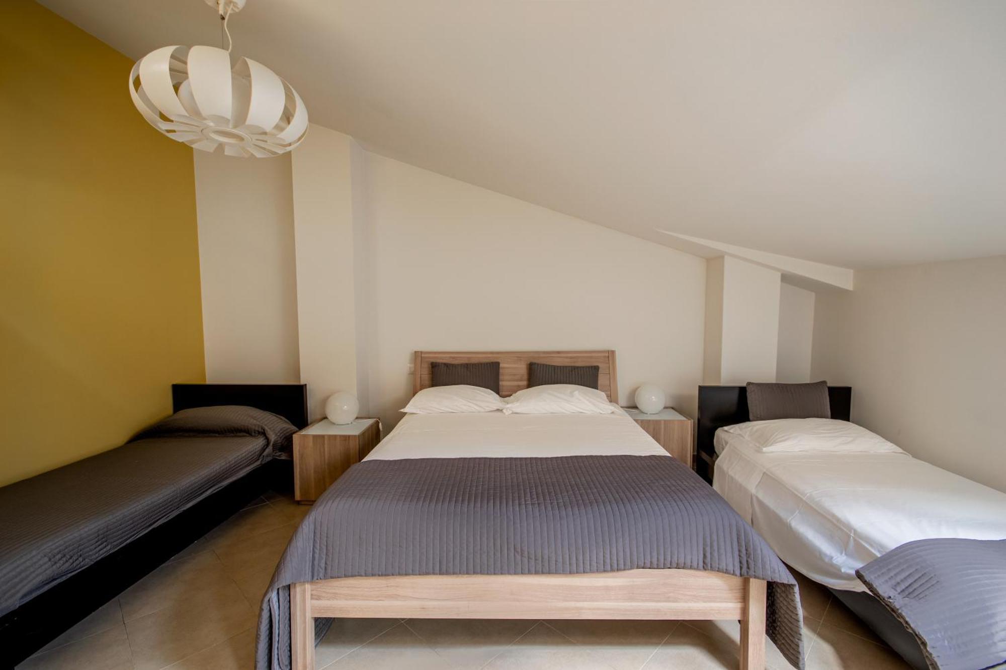 La Scivola Rooms Aci Castello Esterno foto